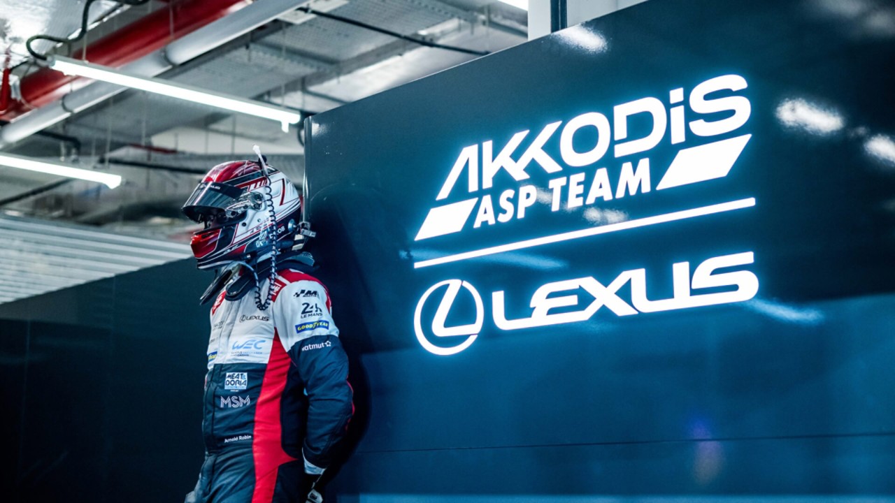 Team AKKODIS ASP driver stood next to Lexus signage