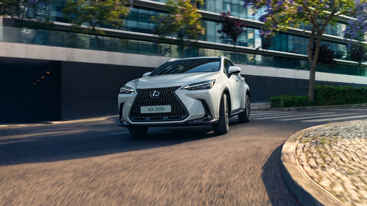 A Lexus NX driving on a street